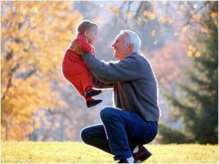 grandfather and kid playing